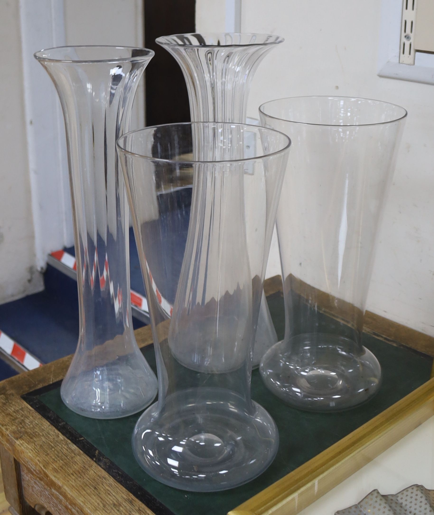 A pair of large glass vases and two similar fluted vases, late 19th century, early 20th 45.5cm